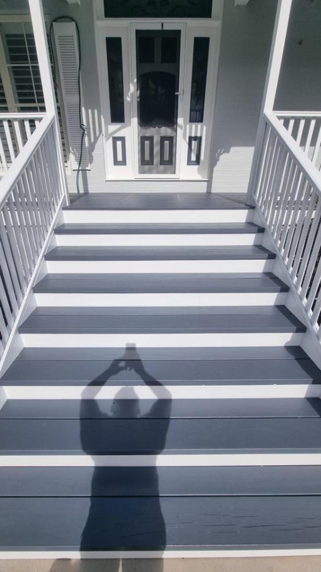 Front stairs after painting, dark grey treads and white balustrades